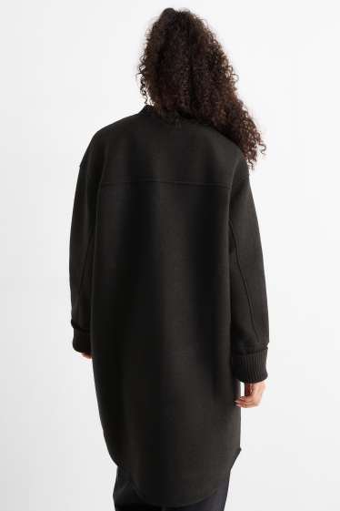 Dona - Abric - negre