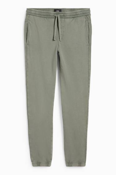 Pánské - Teplákové kalhoty - khaki