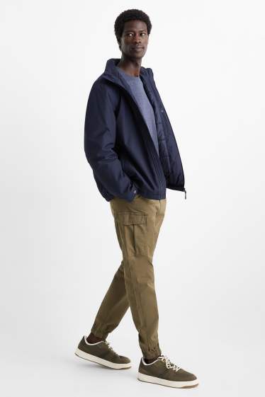 Home - Pantalons cargo - tapered fit - caqui
