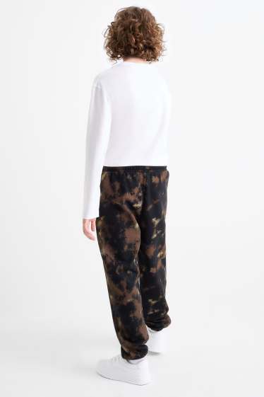 Nen - Pantalons de xandall - estampats - negre
