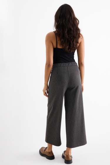 Dámské - Žerzejové kalhoty s páskem - high waist - wide leg - tmavošedá