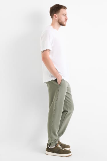 Pánské - Teplákové kalhoty - khaki