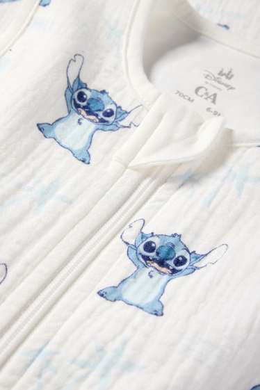 Baby: jongens - Lilo & Stitch - babyslaapzak - 6 tot 9 maanden - wit