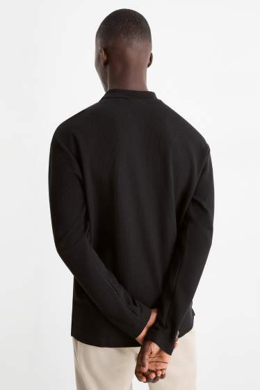Uomo - Polo - regular fit - tessuto tramato - nero