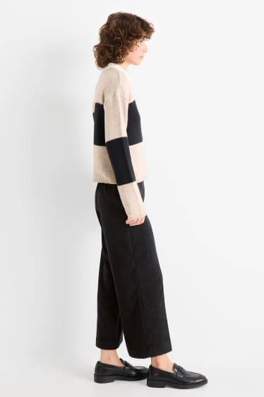 Donna - Pantaloni di velluto a coste - vita media - gamba ampia - nero