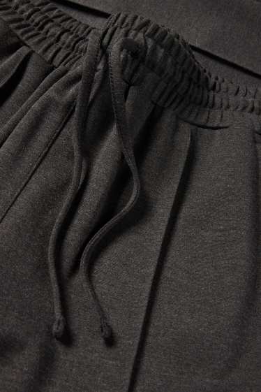 Dámské - Žerzejové kalhoty - mid waist - tapered fit - tmavošedá