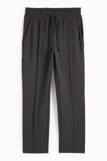 Dámské - Žerzejové kalhoty - mid waist - tapered fit - tmavošedá