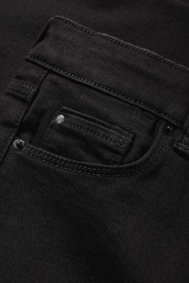 Dames - Bootcut jeans - mid waist - zwart