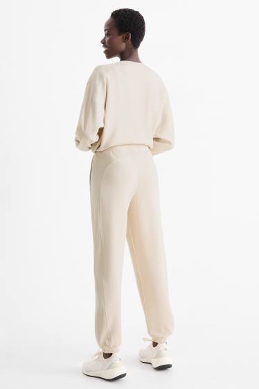 Women - Tracksuit bottoms - light beige