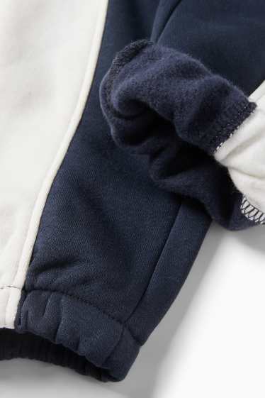 Děti - chlapci - Teplákové kalhoty - tmavomodrá