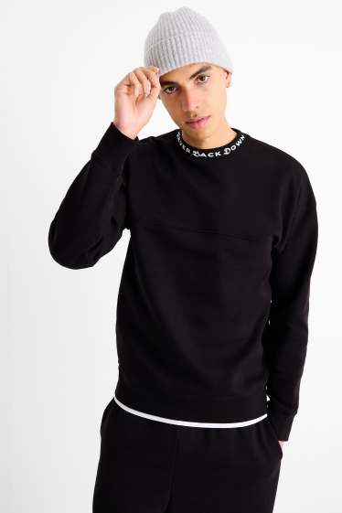 Home - Dessuadora - negre
