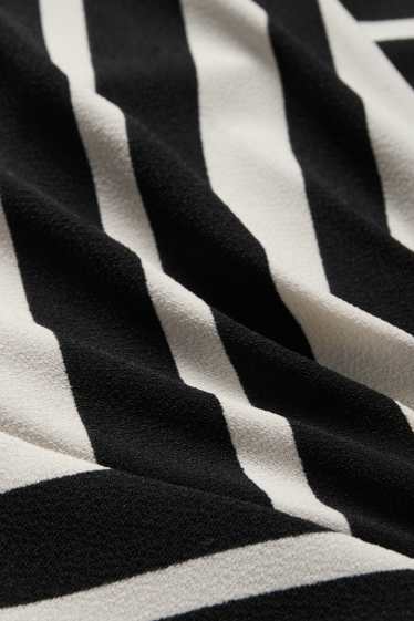 Women - V-neck dress - straight fit - striped - black / beige