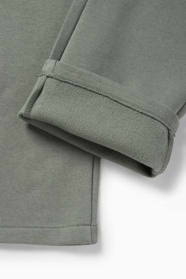 Pánské - Teplákové kalhoty - khaki