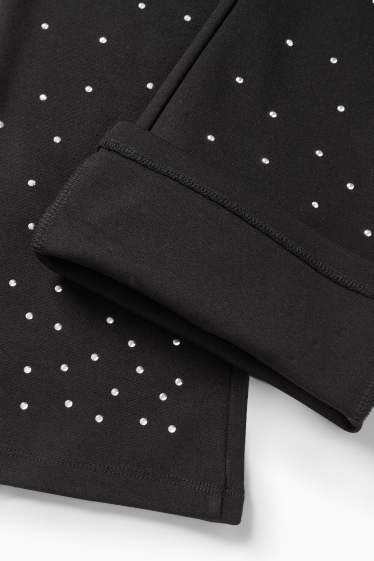 Enfants filles - Flared leggings avec pierres de strass - noir
