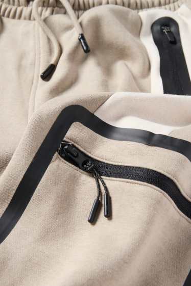 Kinderen: jongens - Cargojoggingbroek - beige