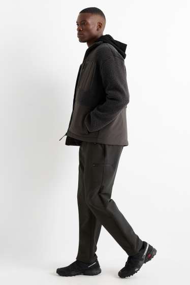 Men - Technical joggers - water-repellent - black