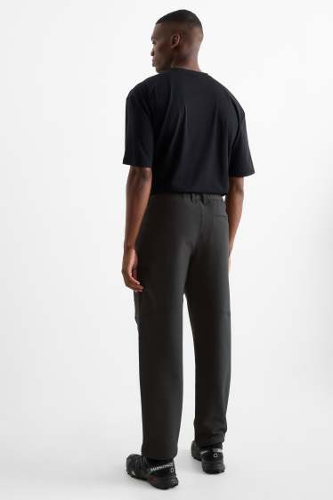 Men - Technical joggers - water-repellent - black
