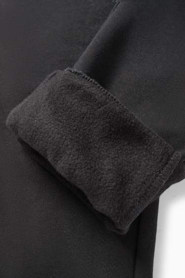 Uomo - Pantaloni sportivi - nero