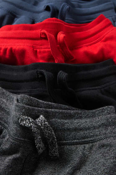 Kinderen: jongens - Set van 4 - joggingbroek - zwart