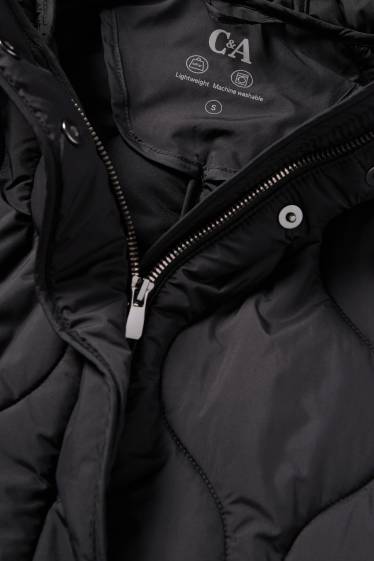 Dona - Abric embuatat amb caputxa - negre