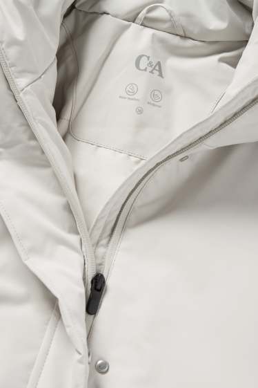 Femmes - Manteau à capuche doté d’une ceinture - rembourré - déperlant - gris clair