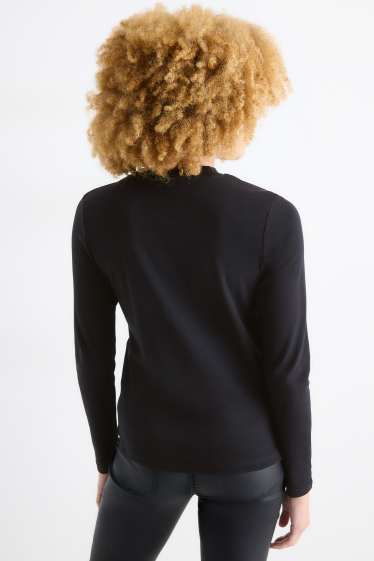 Damen - Langarmshirt mit Strasssteinen - Regular Fit - schwarz