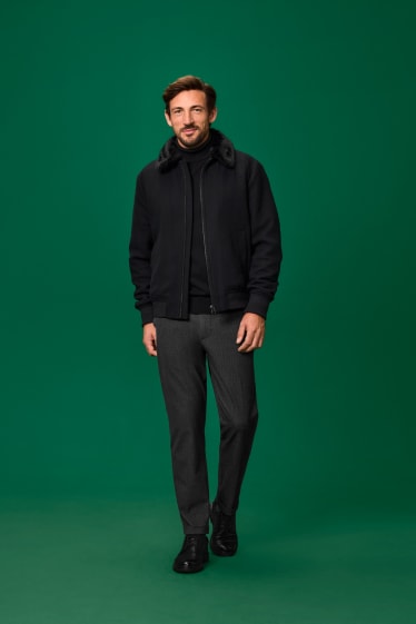 Uomo - Giacca con riporto di ecopelliccia - nero