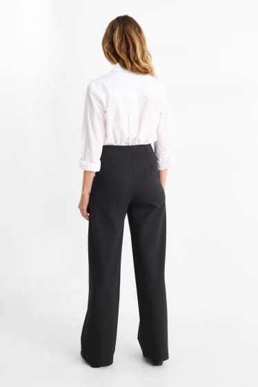 Dámské - Žerzejové kalhoty - mid waist - wide leg - černá