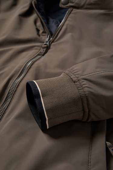 Home - Caçadora - folrada - repel·lent a l’aigua - marró fosc