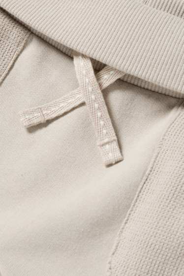 Unisex - Pantalons de xandall per a nadó - beix clar