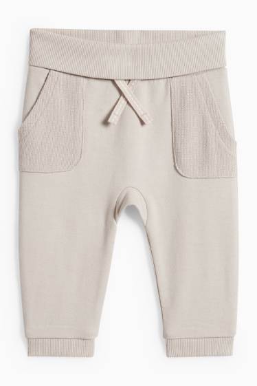 Unisex - Pantalons de xandall per a nadó - beix clar