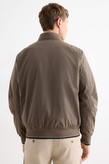 Home - Caçadora - folrada - repel·lent a l’aigua - marró fosc