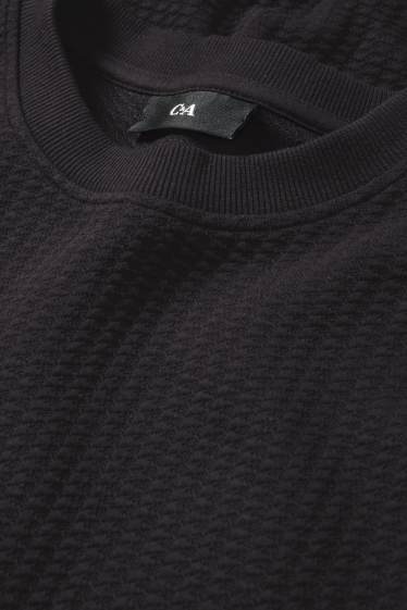 Home - Dessuadora - texturada - negre