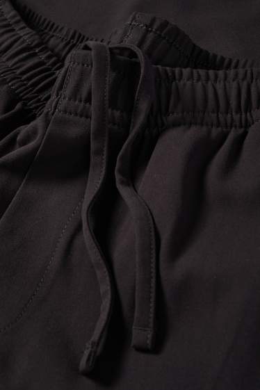 Bărbați - Chino - tapered fit - negru