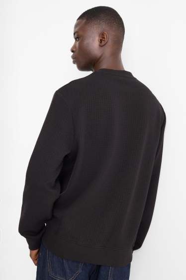 Home - Dessuadora - texturada - negre