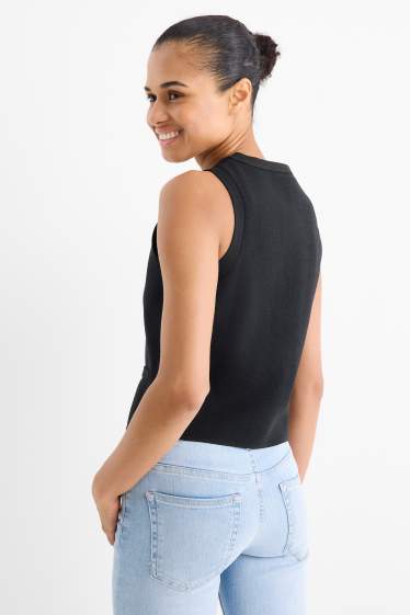 Women - Knitted waistcoat - ribbed - black