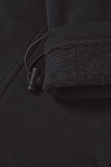 Pánské - Teplákové kalhoty - černá