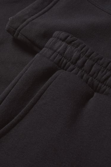 Pánské - Teplákové kalhoty - černá