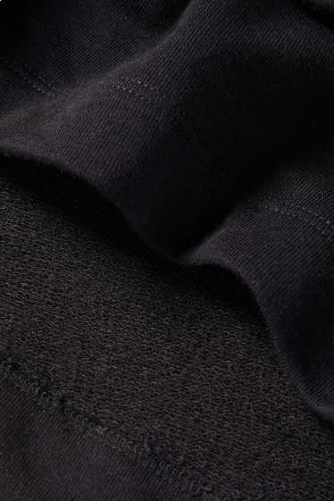 Nena - Paris - conjunt - dessuadora amb caputxa i samarreta sense mànigues - 2 peces - negre/blanc