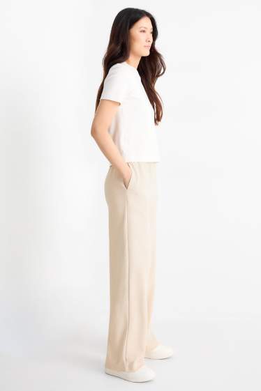 Femmes - Pantalon de jogging - finition texturée - beige clair