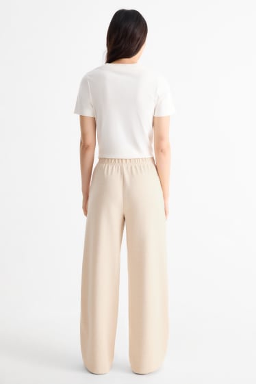 Femmes - Pantalon de jogging - finition texturée - beige clair
