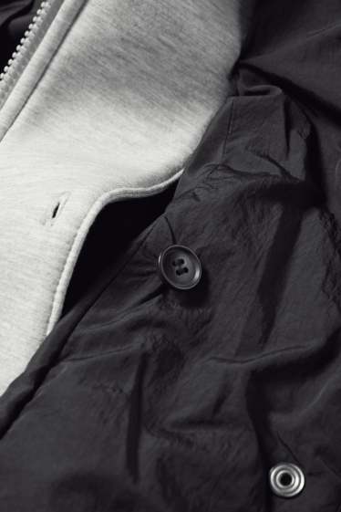 Damen - Steppjacke mit Kapuze - schwarz