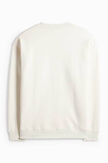 Home - Dessuadora oversized - beix clar