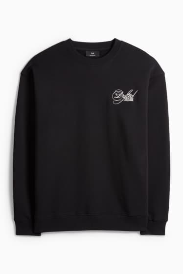 Home - Dessuadora oversized - negre