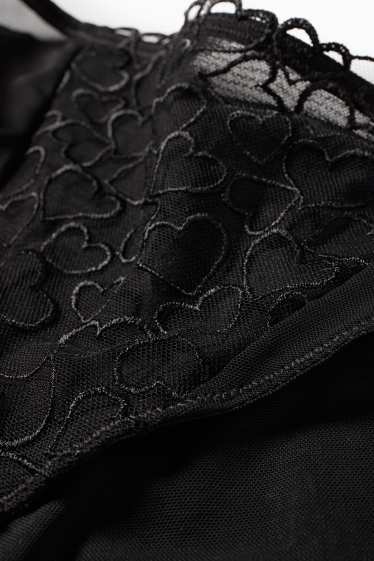 Damen - String - schwarz