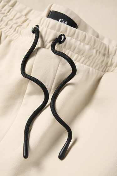 Home - Pantalons curts de xandall - texturats - beix clar