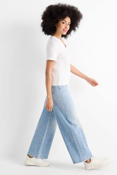 Dona - Wide leg Jeans - mid waist - texà blau clar