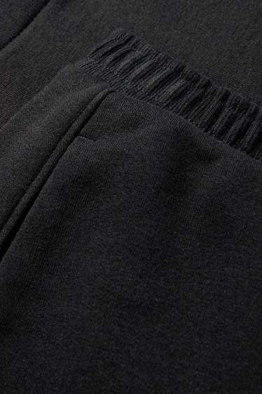 Dámské - Teplákové kalhoty - černá