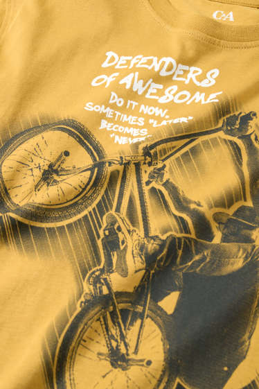 Kinderen: jongens - BMX - set - T-shirt en shorts - 2-delig - licht oranje