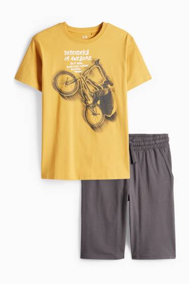 Kinderen: jongens - BMX - set - T-shirt en shorts - 2-delig - licht oranje